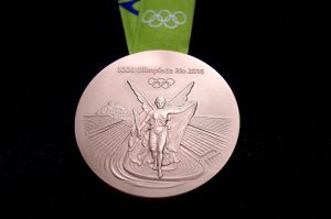 RIO DE JANEIRO, BRAZIL - JUNE 14: A close-up of the Olympic bronze medal during the Launch of Medals and Victory Ceremonies for the Rio 2016 Olympic and Paralympic Games at the Future Arena in Olympic Park on June 14, 2016 in Rio de Janeiro, Brazil. (Photo by Alexandre Loureiro/Getty Images)